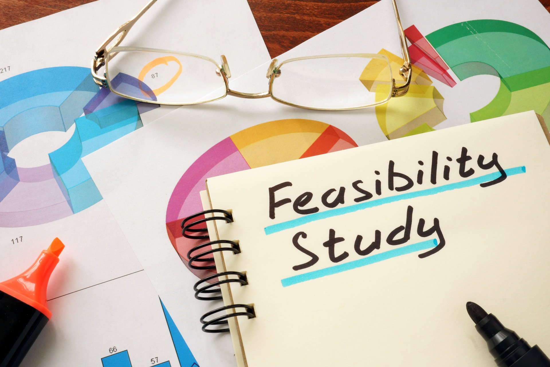 Feasibility study  concept. Notepad on the table.